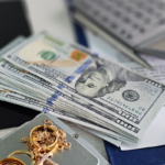Cash and gold jewelry for pawning or selling