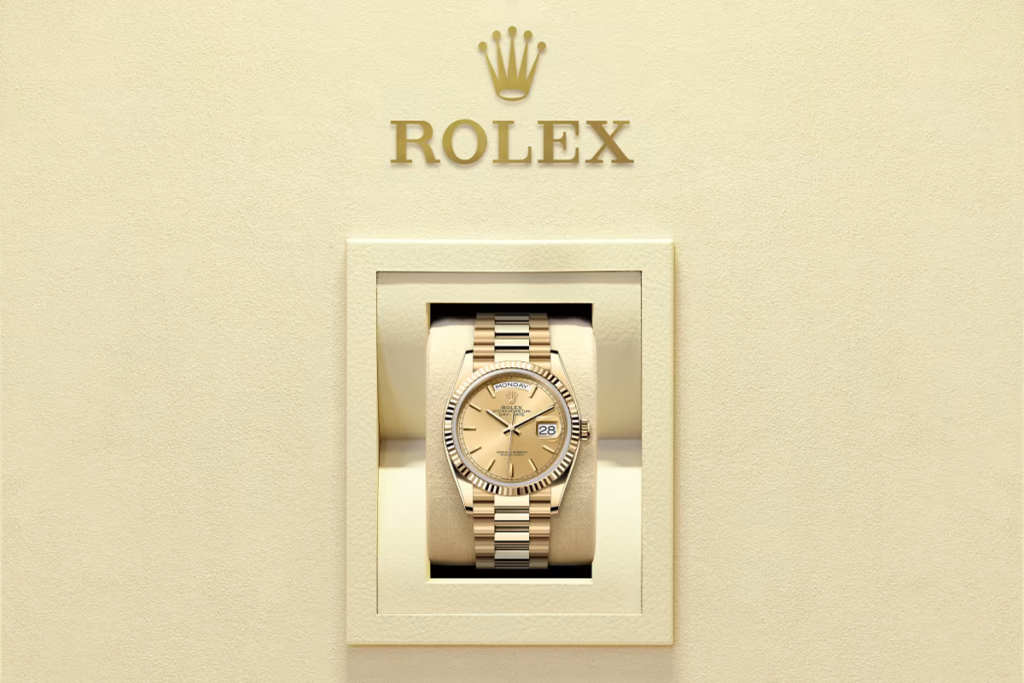 Gold Rolex watch displayed in a presentation case