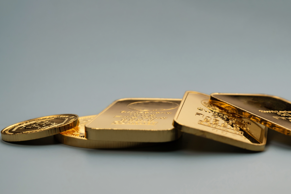 Gold bars and coin as a unique gift for someone who has everything