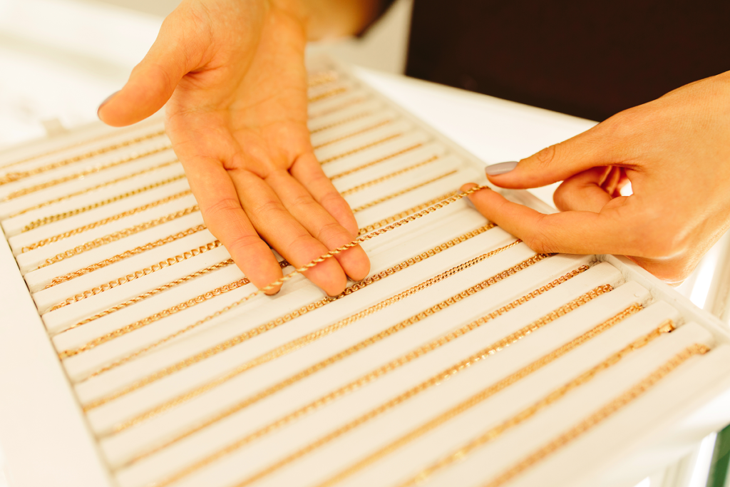 Gold chains being examined during a jewelry evaluation